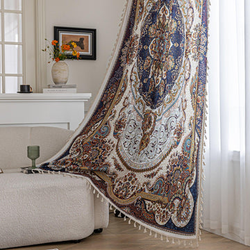 Luxurious bohemian-style curtain with intricate Persian-inspired medallion patterns in navy blue, gold, and white, accented by delicate tassel trim, creating an elegant and artistic home décor statement.