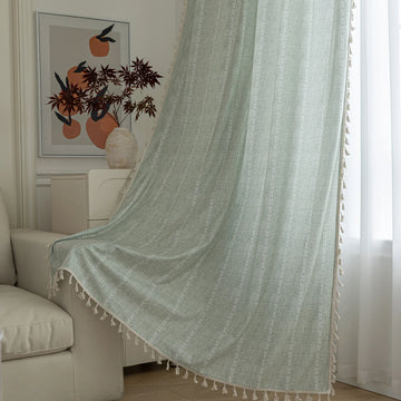 Minimalist sage green curtain with subtle vertical white embroidery and delicate tassel edging — perfect for creating a fresh, airy, and elegant atmosphere in any living room, bedroom, or dining space.