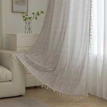 Elegant beige curtain with subtle vertical white embroidery and soft tassel trim — a versatile and timeless design that adds warmth, texture, and understated sophistication to any room decor.