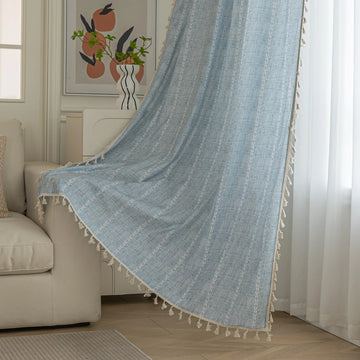 Light blue curtain with delicate vertical white embroidery and charming tassel edging — perfect for creating a fresh, airy, and stylish atmosphere in any living space.
