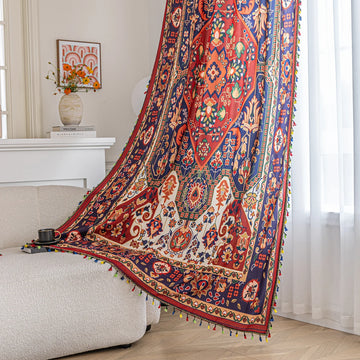 Eye-catching curtain showcasing a rich blend of red, navy, and cream tones with intricate floral and geometric motifs, finished with colorful tassel edging — ideal for creating a warm, artistic, and culturally inspired home ambiance.