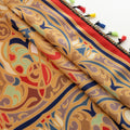 Elegant curtain with intricate multicolor floral and geometric patterns, framed by a decorative border and colorful tassels — perfect for adding a vibrant, artistic touch to any living space.