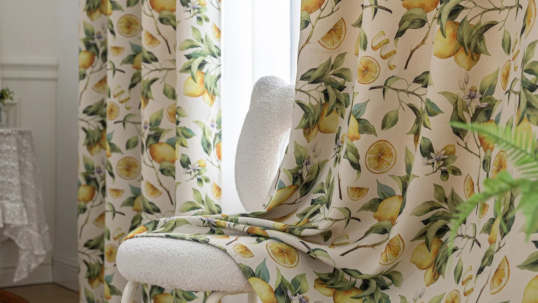 Fresh and vibrant lemon-print blackout curtain featuring lush green leaves and golden citrus fruits, perfect for adding a cheerful Mediterranean touch while blocking sunlight and ensuring privacy in your home.slider_item_rJMWNC