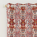 Vibrant blackout curtain featuring an intricate red, orange, and blue damask floral pattern on a soft cream background, designed to block light, enhance privacy, and add a bold, elegant touch to any room décor.