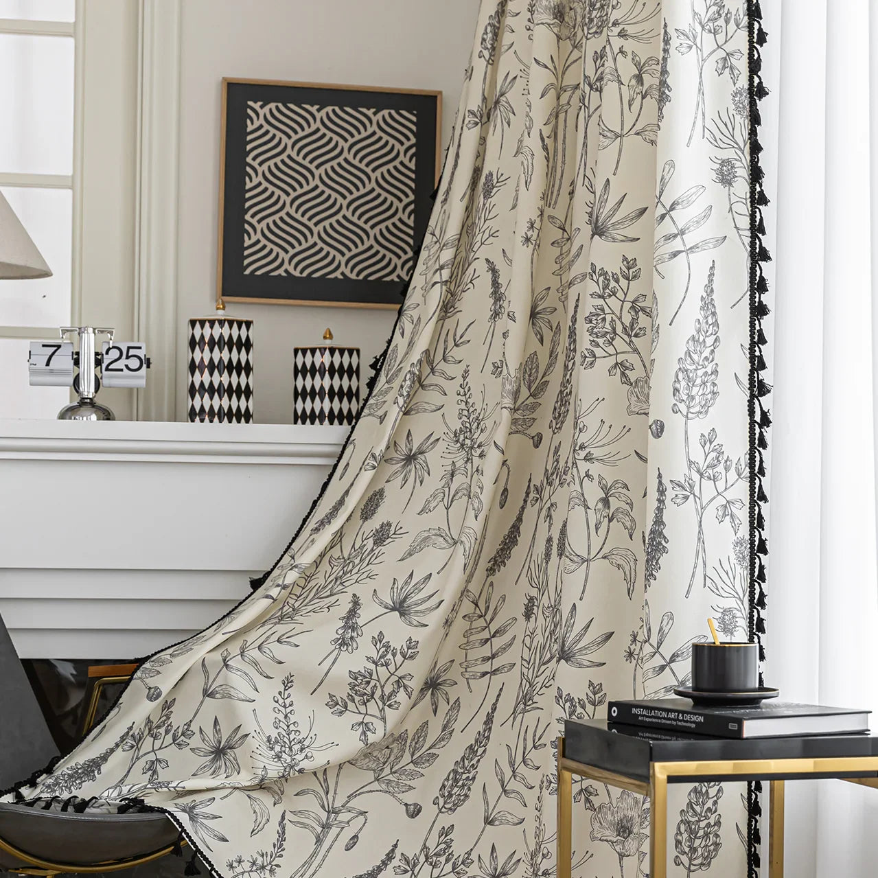 Cream curtain with black botanical print and black tassel trim