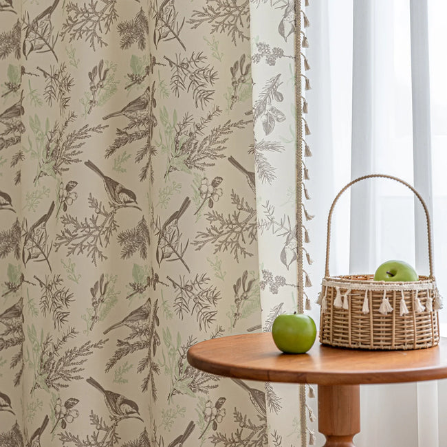 Beige curtain with detailed bird and botanical print in brown and green tones, bringing a natural and vintage-inspired charm to home decor.