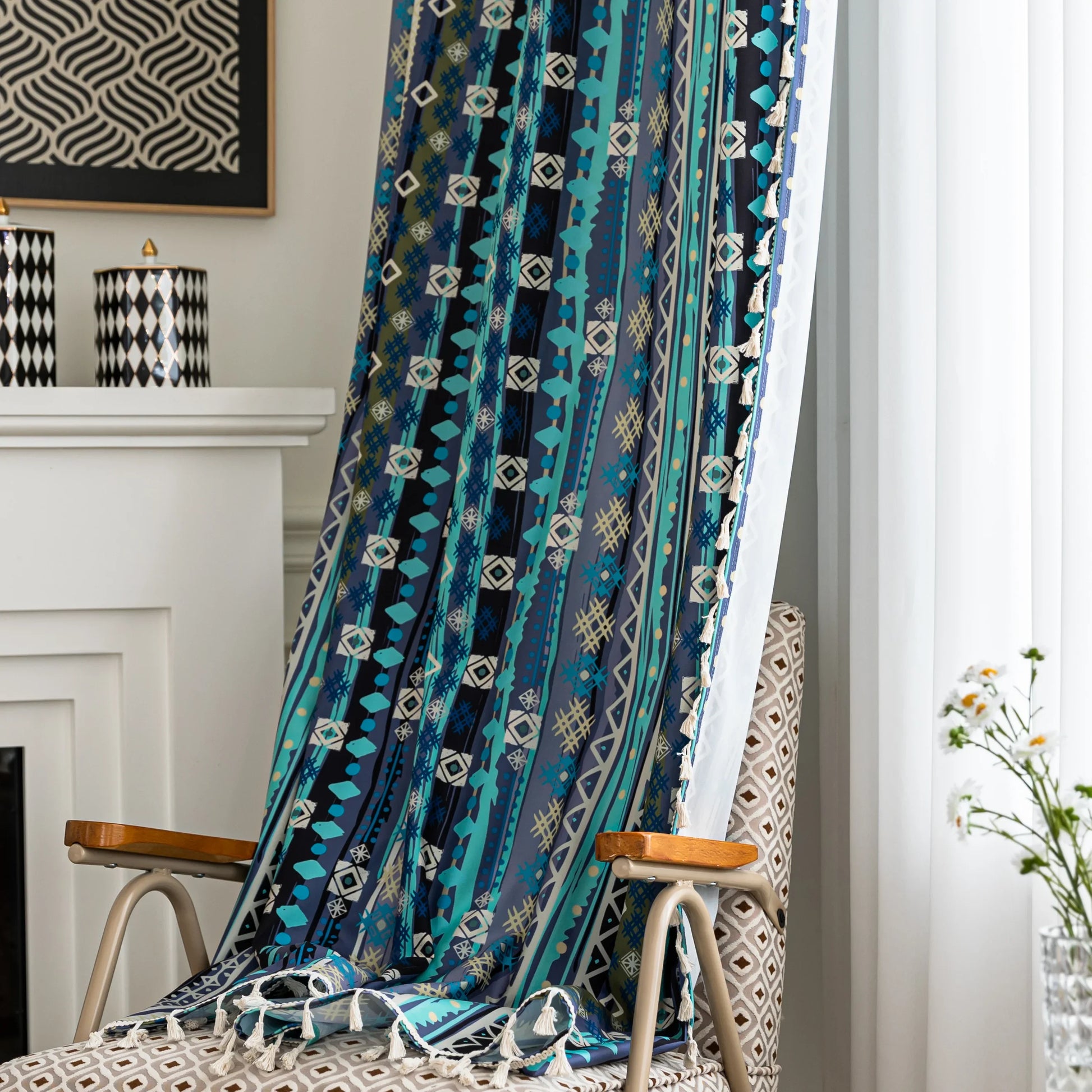 Blue geometric patterned curtain with tribal-inspired design, featuring white tassel trim for a bold and decorative accent.