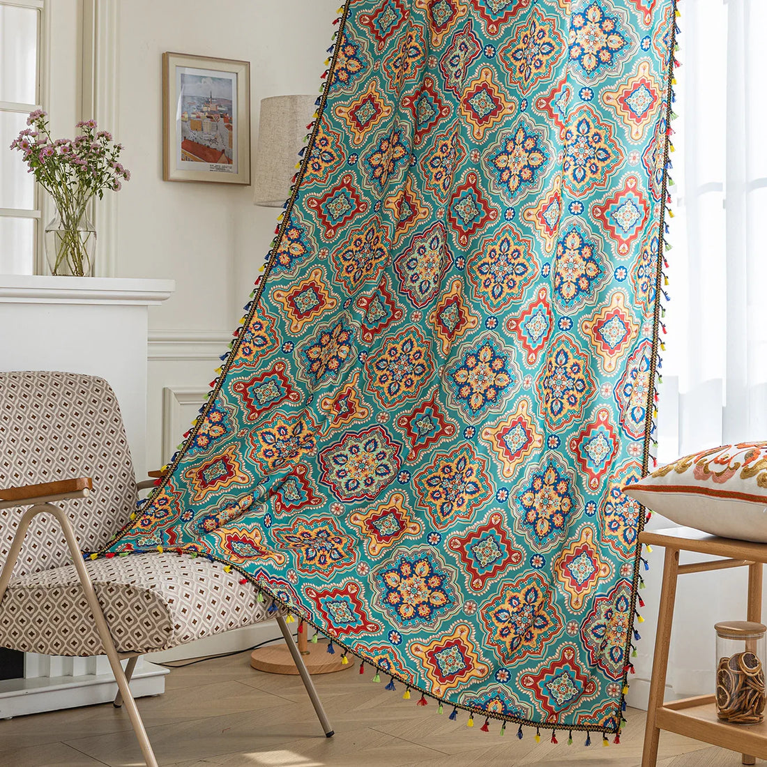 Colorful bohemian-style curtain with intricate geometric and floral patterns in turquoise, red, yellow, and navy, adding a vibrant touch to living room décor.