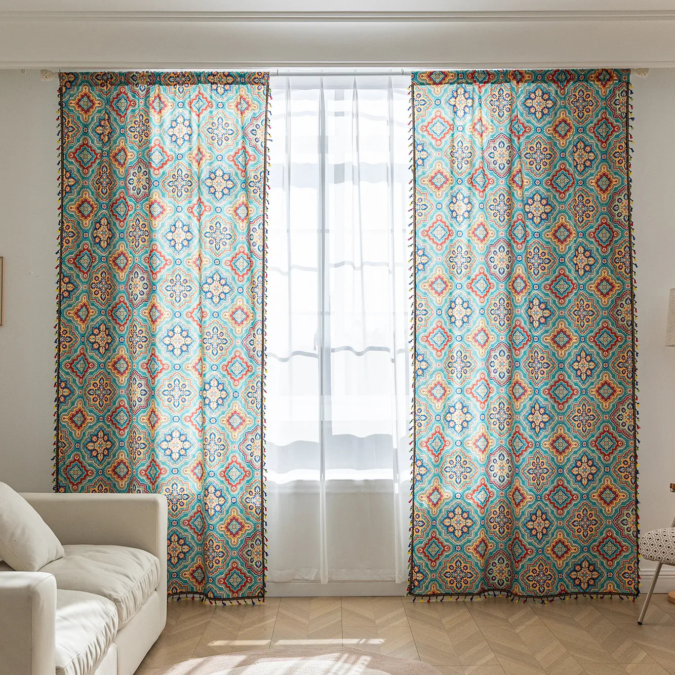 Colorful bohemian-style curtain with intricate geometric and floral patterns in turquoise, red, yellow, and navy, adding a vibrant touch to living room décor.