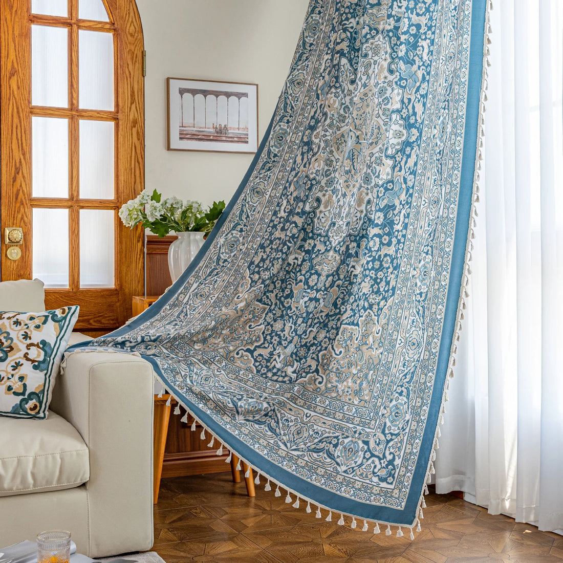 Elegant blue and white patterned curtains with intricate Persian-inspired design.