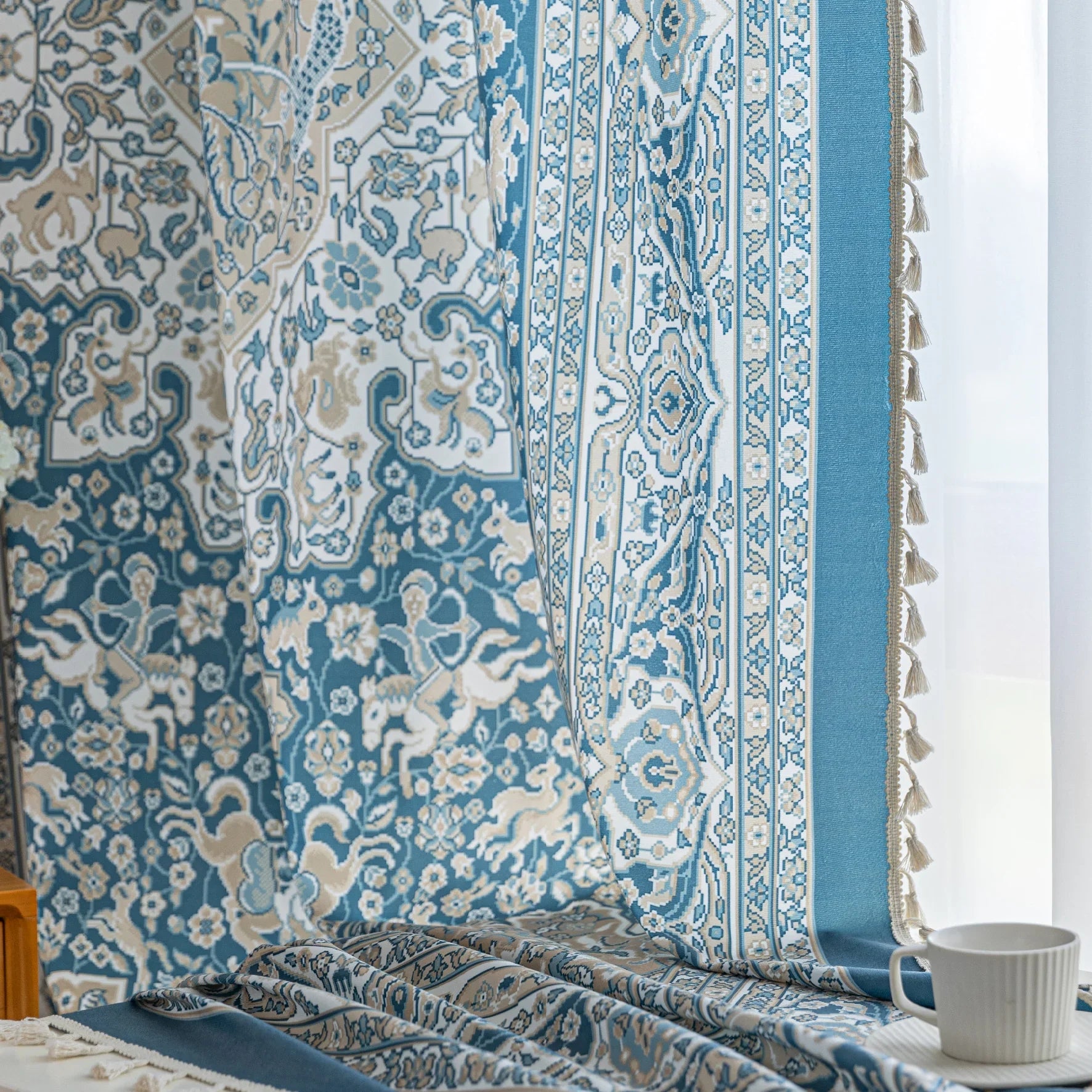 Elegant blue and white patterned curtains with intricate Persian-inspired design.