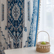 Blue and white curtain fabric with abstract watercolor-style pattern, accented by solid blue border and decorative white tassel trim for a coastal and artistic home d¨¦cor look.