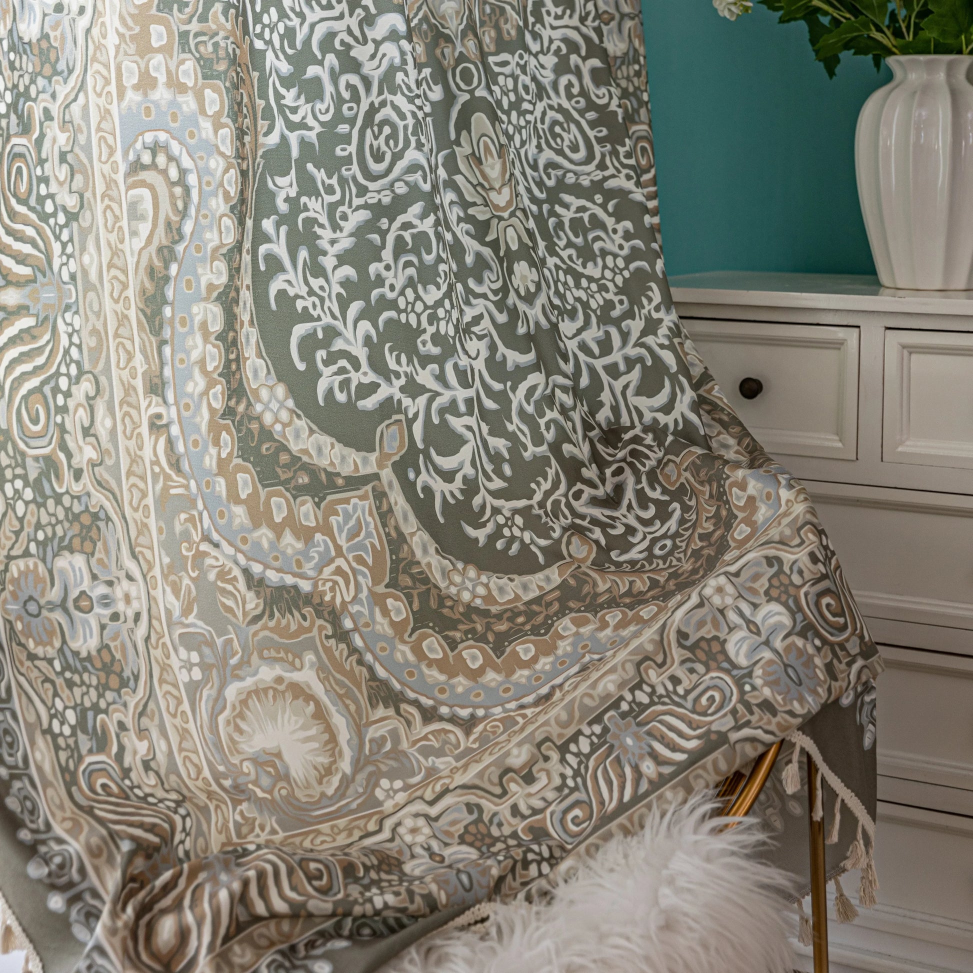 Elegant curtain with intricate paisley and floral patterns in green, beige, and white tones, creating a vintage, bohemian-inspired home décor look.