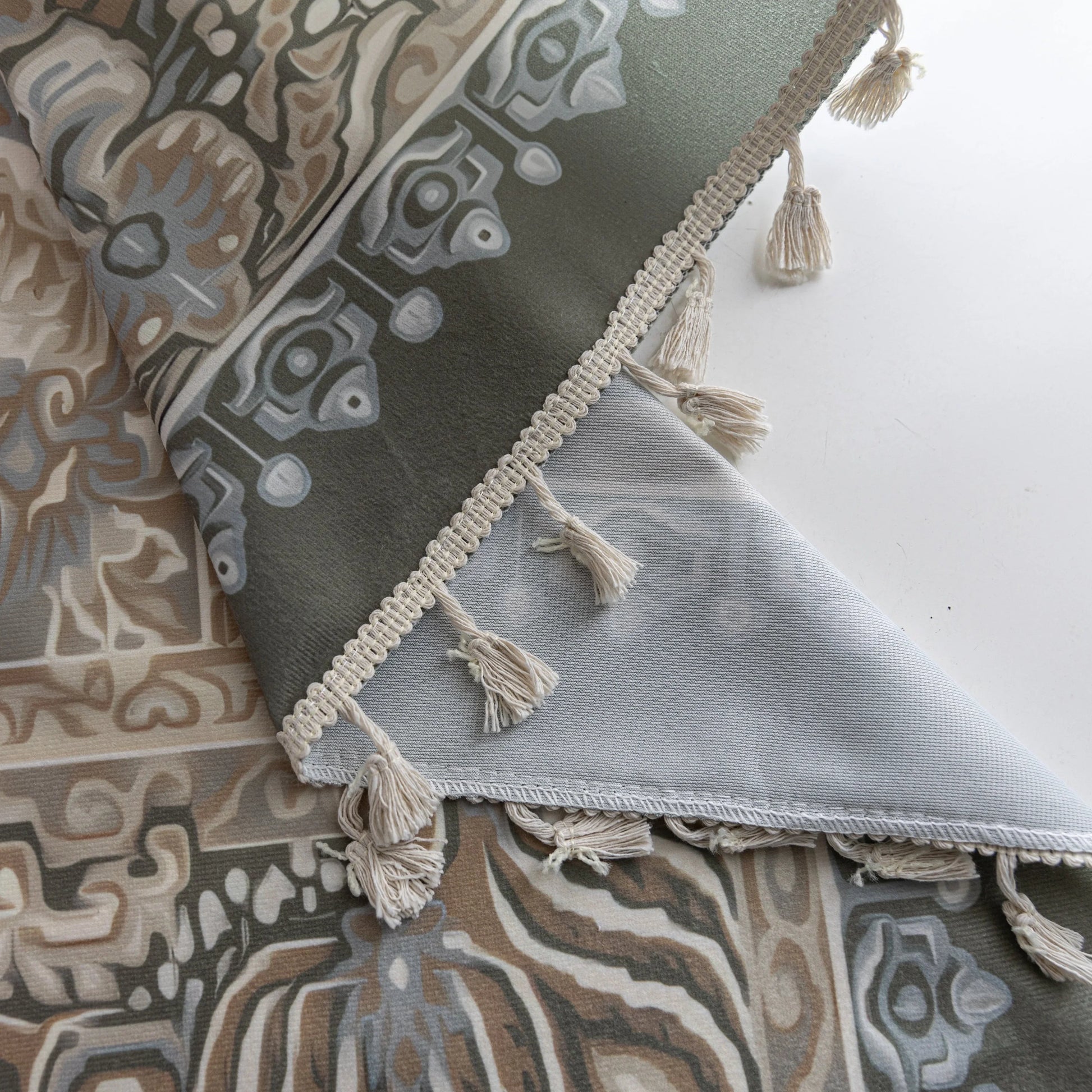 Elegant curtain with intricate paisley and floral patterns in green, beige, and white tones, creating a vintage, bohemian-inspired home décor look.