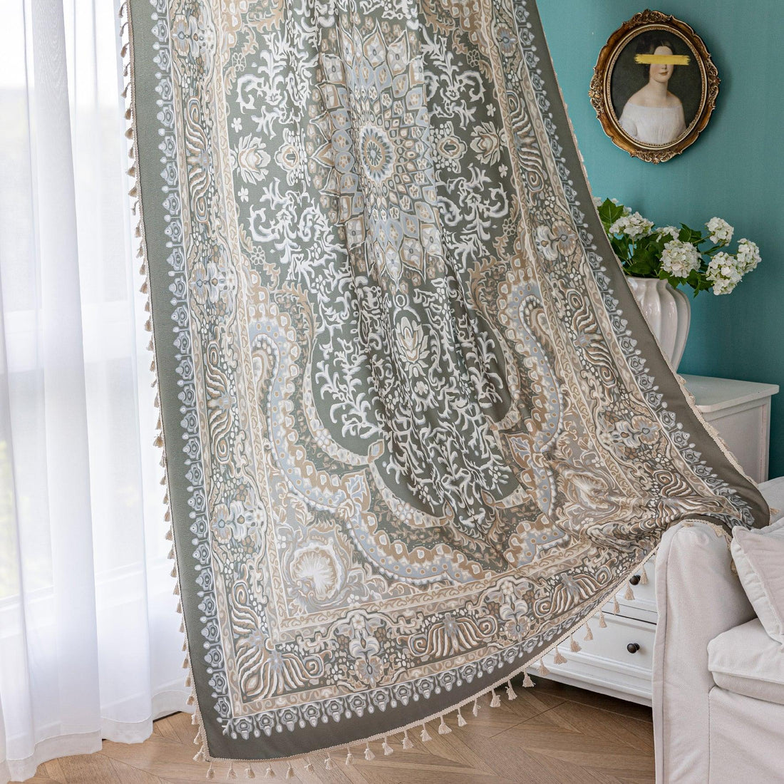 Elegant green curtain with intricate white and beige floral and paisley patterns, featuring a central medallion design, adding a vintage and bohemian charm to home décor.