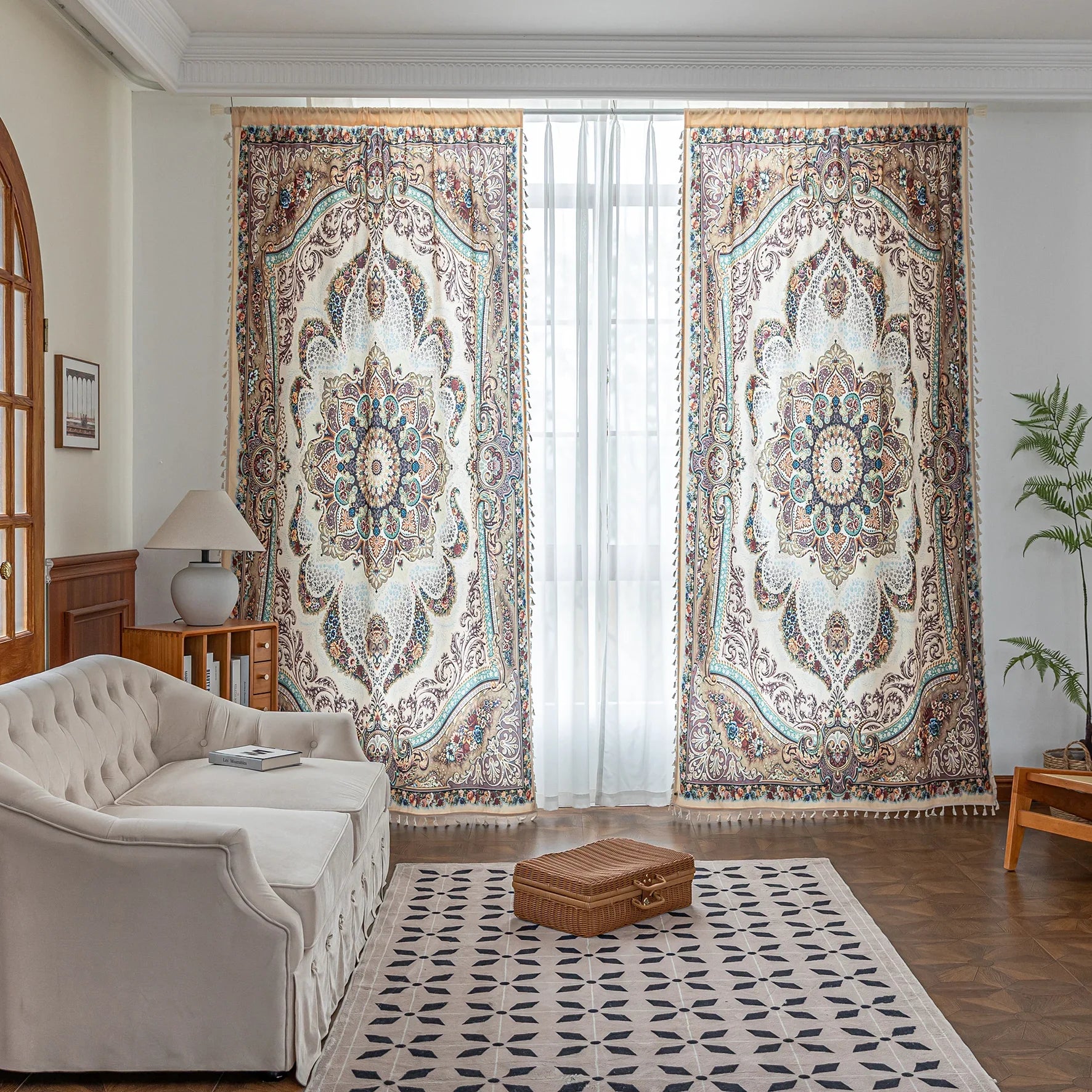 Elegant pair of Persian-style curtains featuring intricate mandala floral patterns in beige, teal, and burgundy tones, adding a luxurious and artistic touch to a bright living room interior.