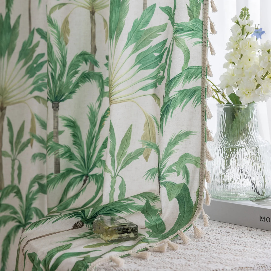 Tropical palm leaf curtain with soft green botanical prints and delicate tassel trim, perfect for adding a fresh, airy, and nature-inspired vibe to your living room, bedroom, or beach house décor.