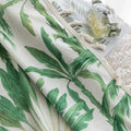 Tropical palm leaf curtain with soft green botanical prints and delicate tassel trim, perfect for adding a fresh, airy, and nature-inspired vibe to your living room, bedroom, or beach house décor.