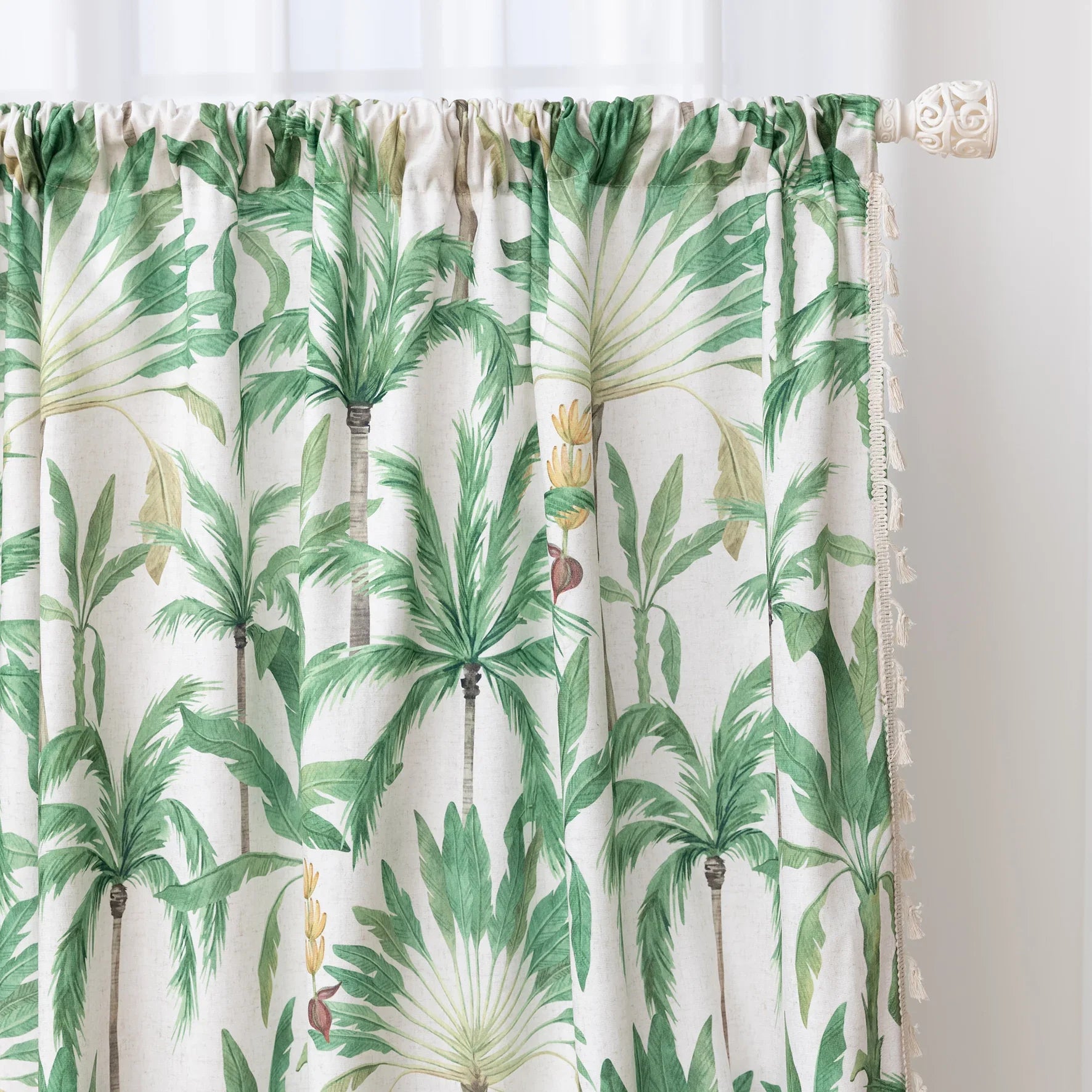 Tropical palm leaf curtain with soft green botanical prints and delicate tassel trim, perfect for adding a fresh, airy, and nature-inspired vibe to your living room, bedroom, or beach house décor.