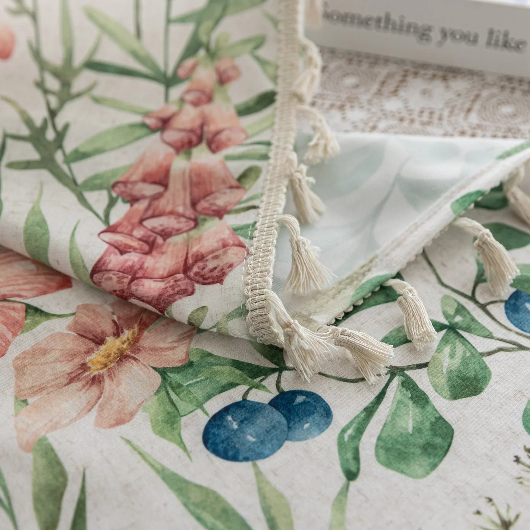 Elegant floral curtain featuring soft pastel blooms, green leafy patterns, and delicate tassel edging — perfect for bringing a fresh, romantic, and nature-inspired charm to your living room, bedroom, or cottage-style décor.