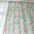 Elegant floral curtain featuring soft pastel blooms, green leafy patterns, and delicate tassel edging — perfect for bringing a fresh, romantic, and nature-inspired charm to your living room, bedroom, or cottage-style décor.