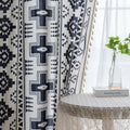 Stylish bohemian curtain featuring bold black geometric and cross patterns on a neutral background, accented with decorative tassel trim — perfect for adding a modern tribal touch to your living room, bedroom, or eclectic home décor.