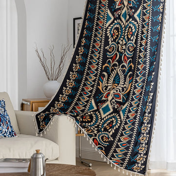 Luxurious bohemian-style curtain featuring a bold black base with intricate beige, red, and teal floral and geometric patterns, finished with elegant tassel trim — perfect for adding vibrant charm and cultural flair to your home décor.