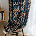 Luxurious bohemian-style curtain featuring a bold black base with intricate beige, red, and teal floral and geometric patterns, finished with elegant tassel trim — perfect for adding vibrant charm and cultural flair to your home décor.