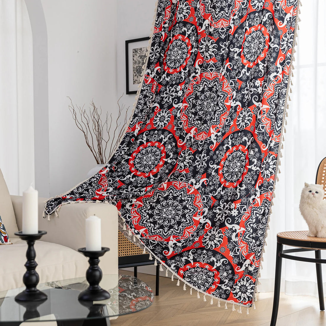 Vibrant bohemian-style curtain with intricate mandala patterns in striking red, black, and white tones, accented with swirling floral details and finished with elegant white tassel trim — perfect for adding bold artistic flair and cultural charm to any living space.
