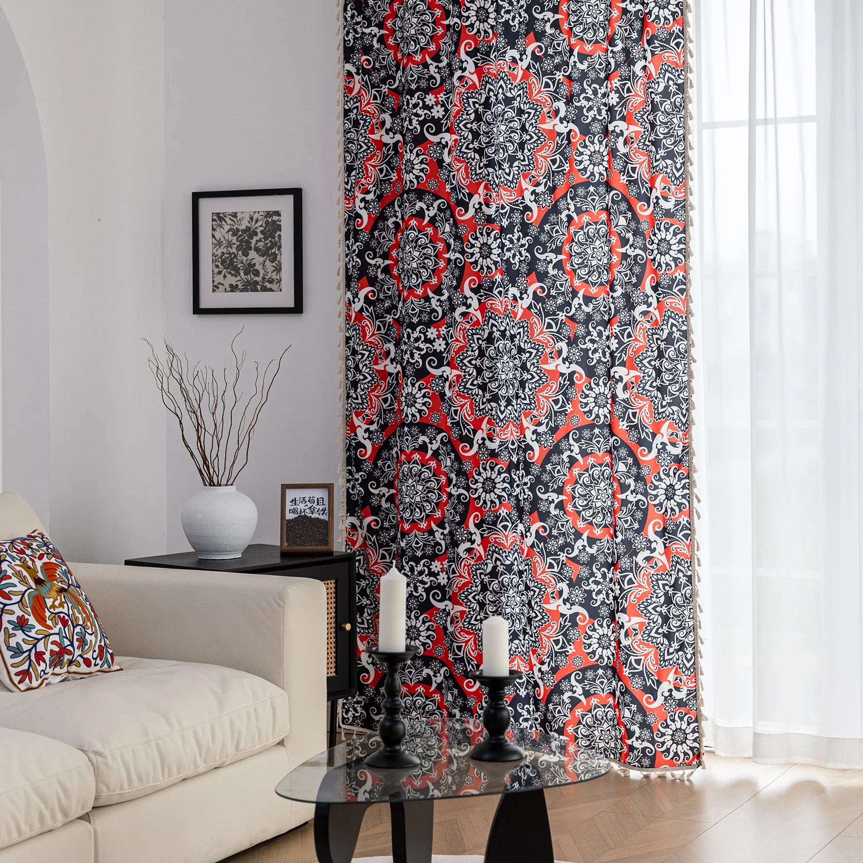 Vibrant bohemian-style curtain with intricate mandala patterns in striking red, black, and white tones, accented with swirling floral details and finished with elegant white tassel trim — perfect for adding bold artistic flair and cultural charm to any living space.