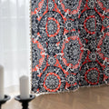 Vibrant bohemian-style curtain with intricate mandala patterns in striking red, black, and white tones, accented with swirling floral details and finished with elegant white tassel trim — perfect for adding bold artistic flair and cultural charm to any living space.