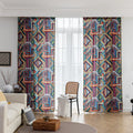 Vibrant geometric bohemian curtain with bold multicolor diamond patterns, featuring intricate woven-style designs and colorful tassel trim — ideal for adding a lively, artistic statement to any room décor.