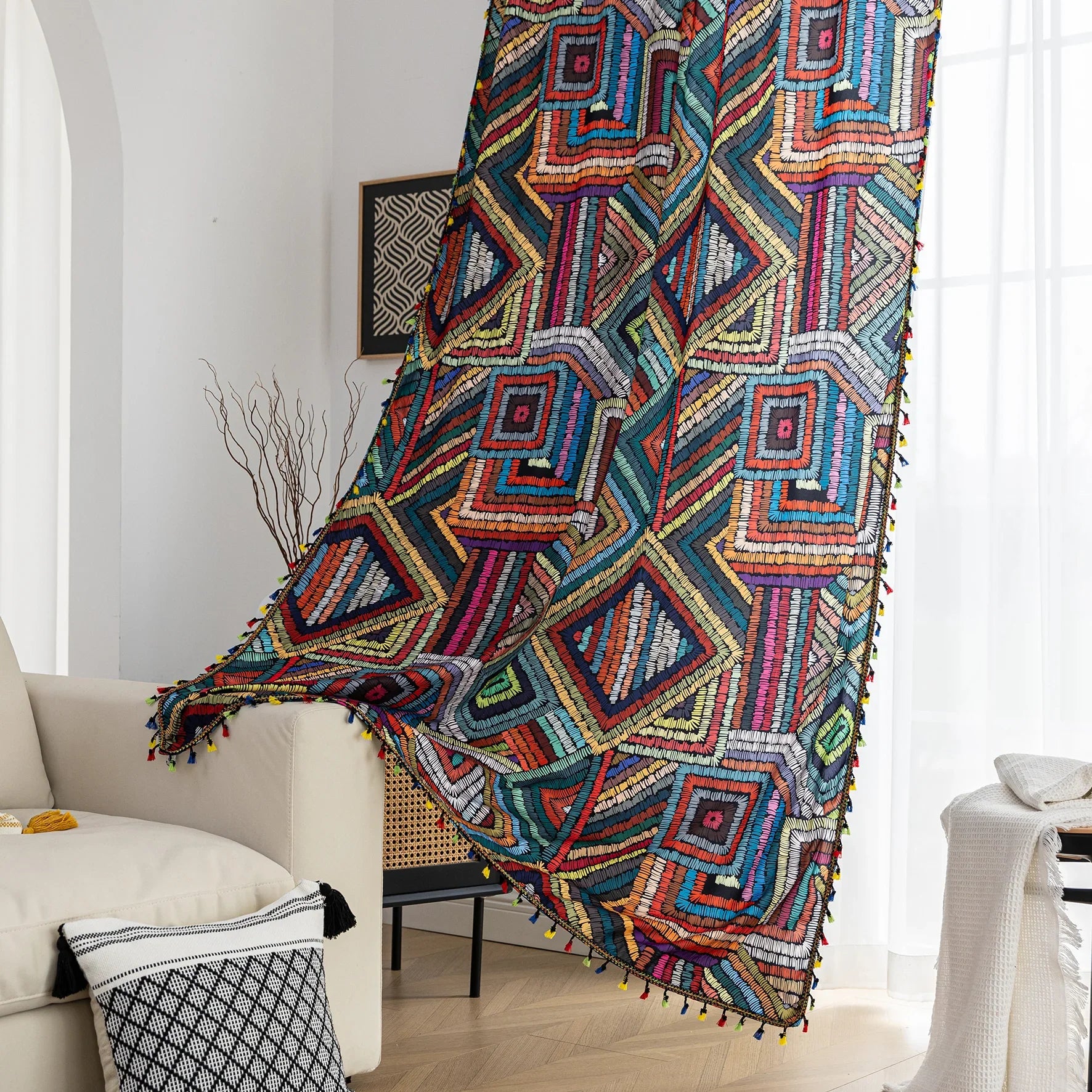 Vibrant geometric bohemian curtain with bold multicolor diamond patterns, featuring intricate woven-style designs and colorful tassel trim — ideal for adding a lively, artistic statement to any room décor.