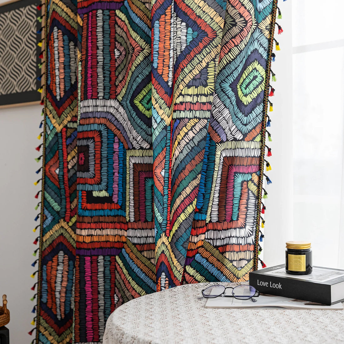 Vibrant geometric bohemian curtain with bold multicolor diamond patterns, featuring intricate woven-style designs and colorful tassel trim — ideal for adding a lively, artistic statement to any room décor.