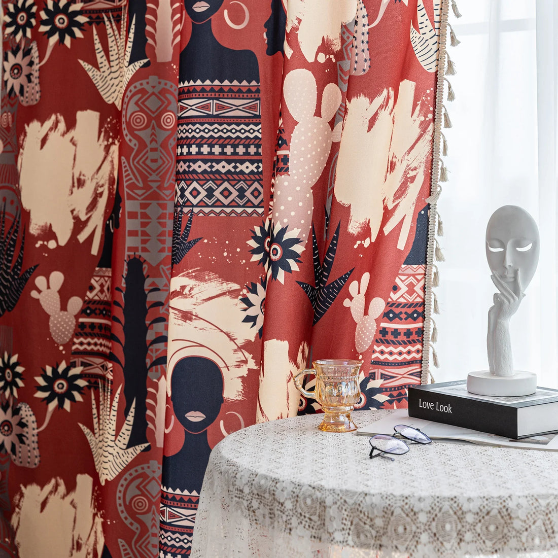 Modern bohemian curtain featuring an abstract tribal-inspired design in earthy terracotta, beige, and black tones, adorned with cactus and floral motifs, and finished with delicate white tassel trim — perfect for adding a warm, artistic touch to your home décor.