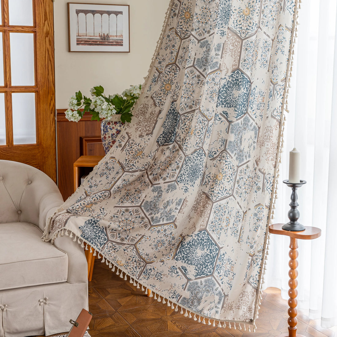 Elegant curtain with a unique hexagon tile-inspired pattern in muted blue, beige, and soft gold tones on a light cream background, finished with delicate fringe trim — perfect for adding a sophisticated, Mediterranean touch to your living space.