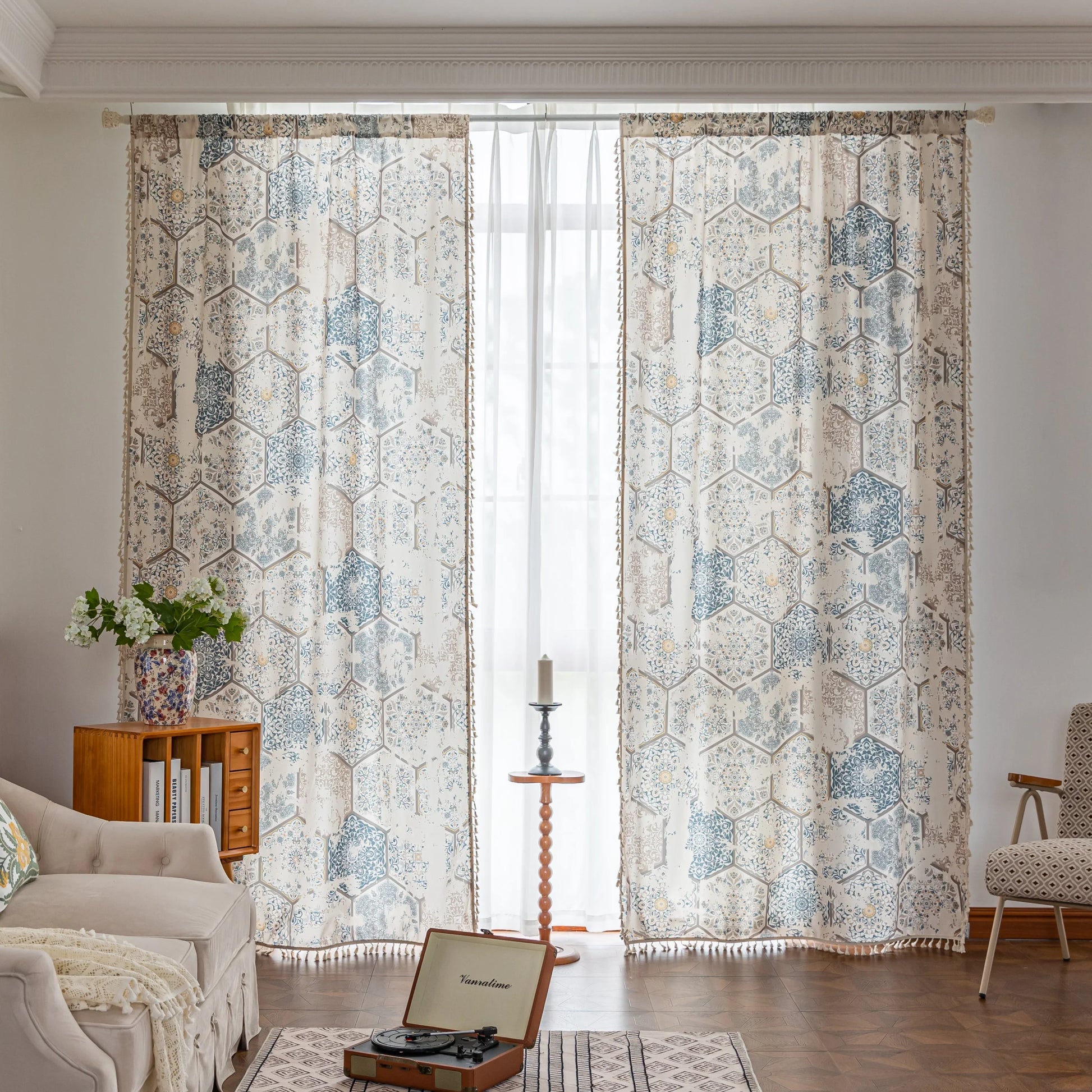 Elegant curtain with a unique hexagon tile-inspired pattern in muted blue, beige, and soft gold tones on a light cream background, finished with delicate fringe trim — perfect for adding a sophisticated, Mediterranean touch to your living space.