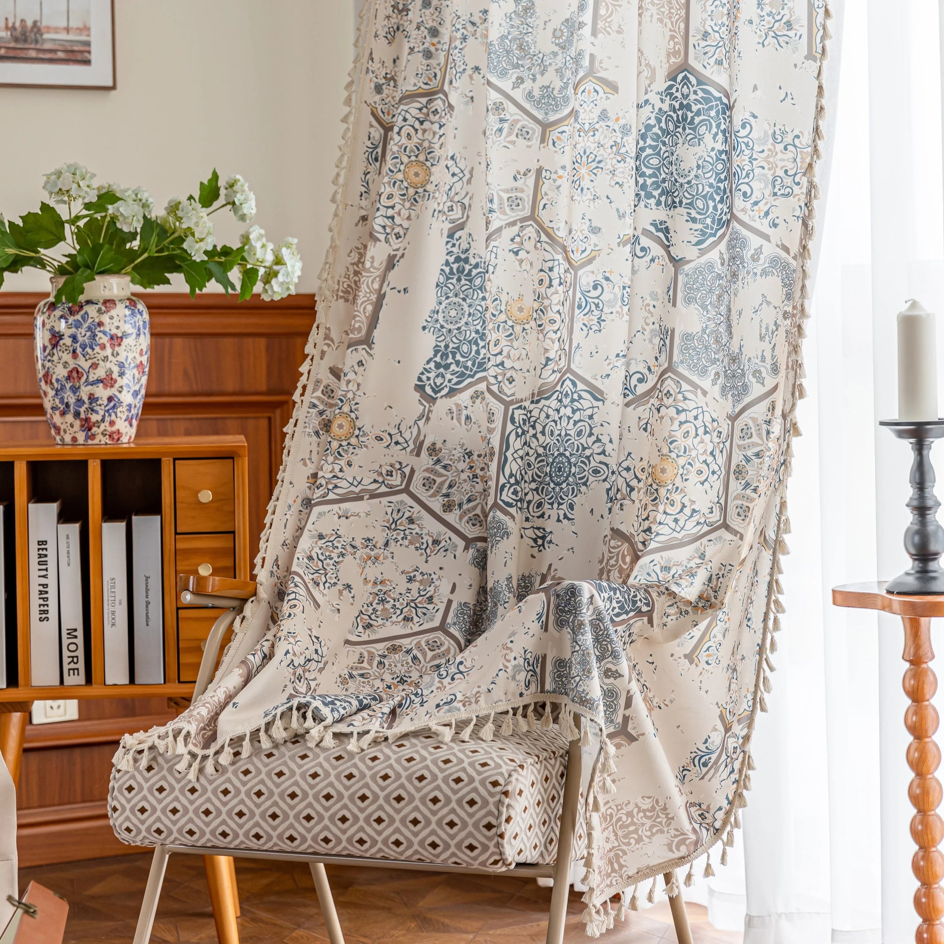 Elegant curtain with a unique hexagon tile-inspired pattern in muted blue, beige, and soft gold tones on a light cream background, finished with delicate fringe trim — perfect for adding a sophisticated, Mediterranean touch to your living space.