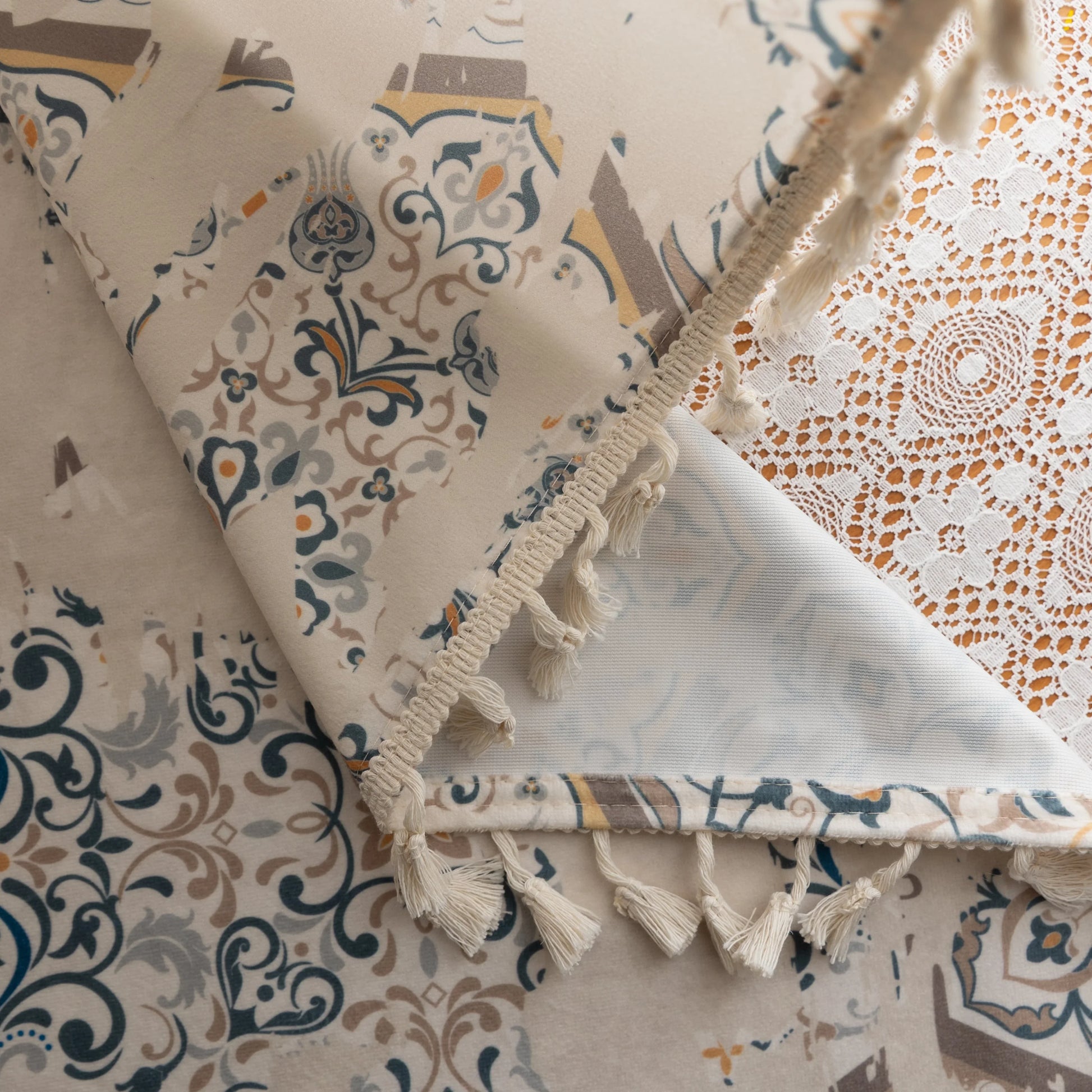Elegant curtain with a unique hexagon tile-inspired pattern in muted blue, beige, and soft gold tones on a light cream background, finished with delicate fringe trim — perfect for adding a sophisticated, Mediterranean touch to your living space.