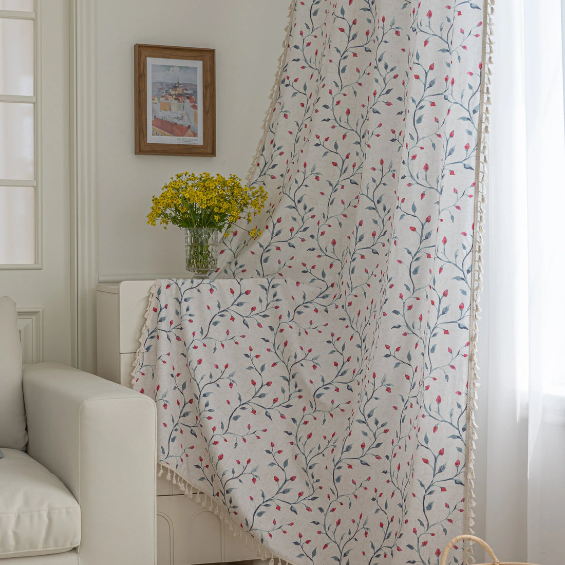 Light and airy curtain with a delicate floral vine pattern in soft blue and pink on a natural beige background, finished with a subtle fringe trim — perfect for bringing a fresh, romantic, and nature-inspired touch to your home décor.