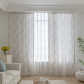 Light and airy curtain with a delicate floral vine pattern in soft blue and pink on a natural beige background, finished with a subtle fringe trim — perfect for bringing a fresh, romantic, and nature-inspired touch to your home décor.