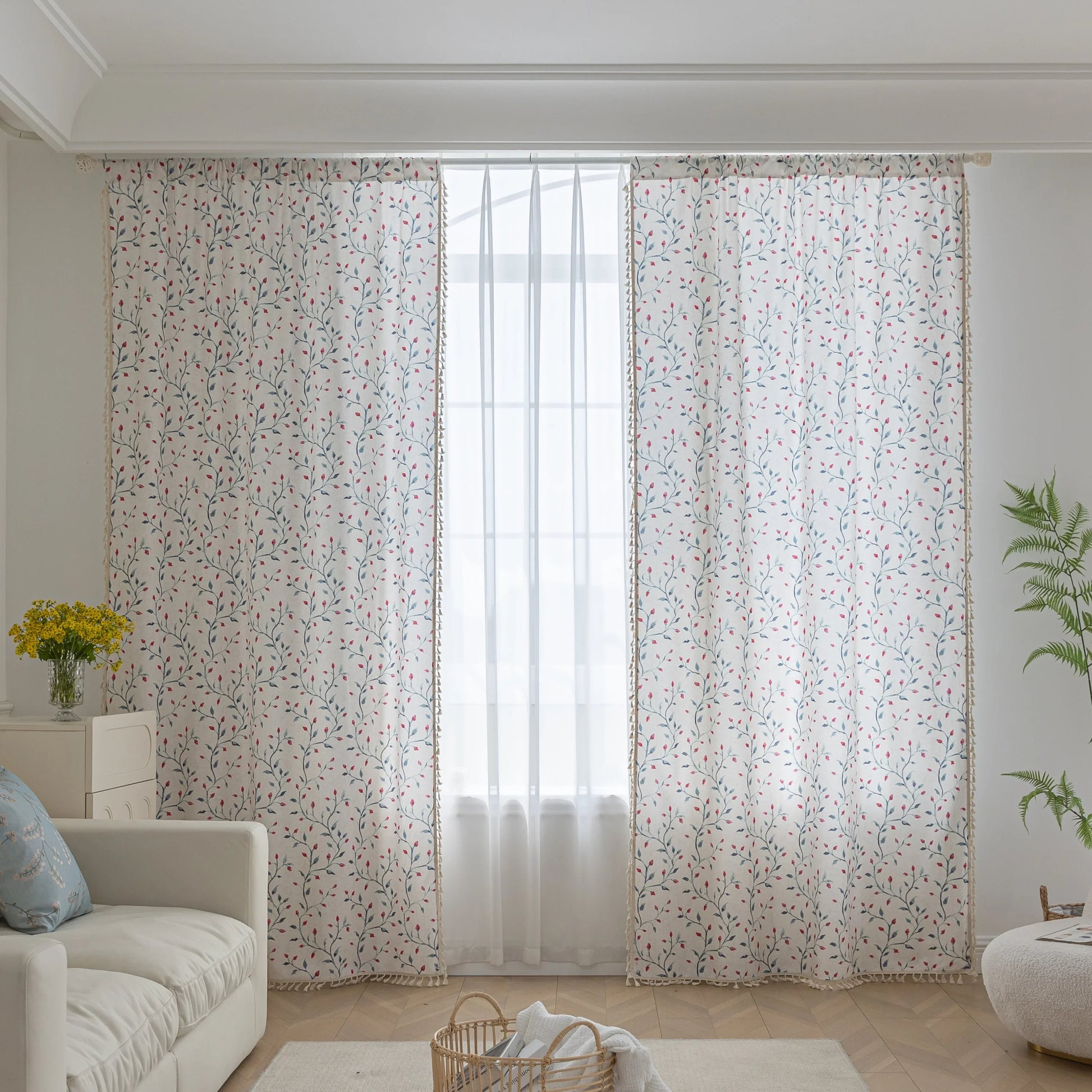 Light and airy curtain with a delicate floral vine pattern in soft blue and pink on a natural beige background, finished with a subtle fringe trim — perfect for bringing a fresh, romantic, and nature-inspired touch to your home décor.