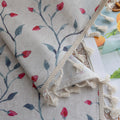 Light and airy curtain with a delicate floral vine pattern in soft blue and pink on a natural beige background, finished with a subtle fringe trim — perfect for bringing a fresh, romantic, and nature-inspired touch to your home décor.