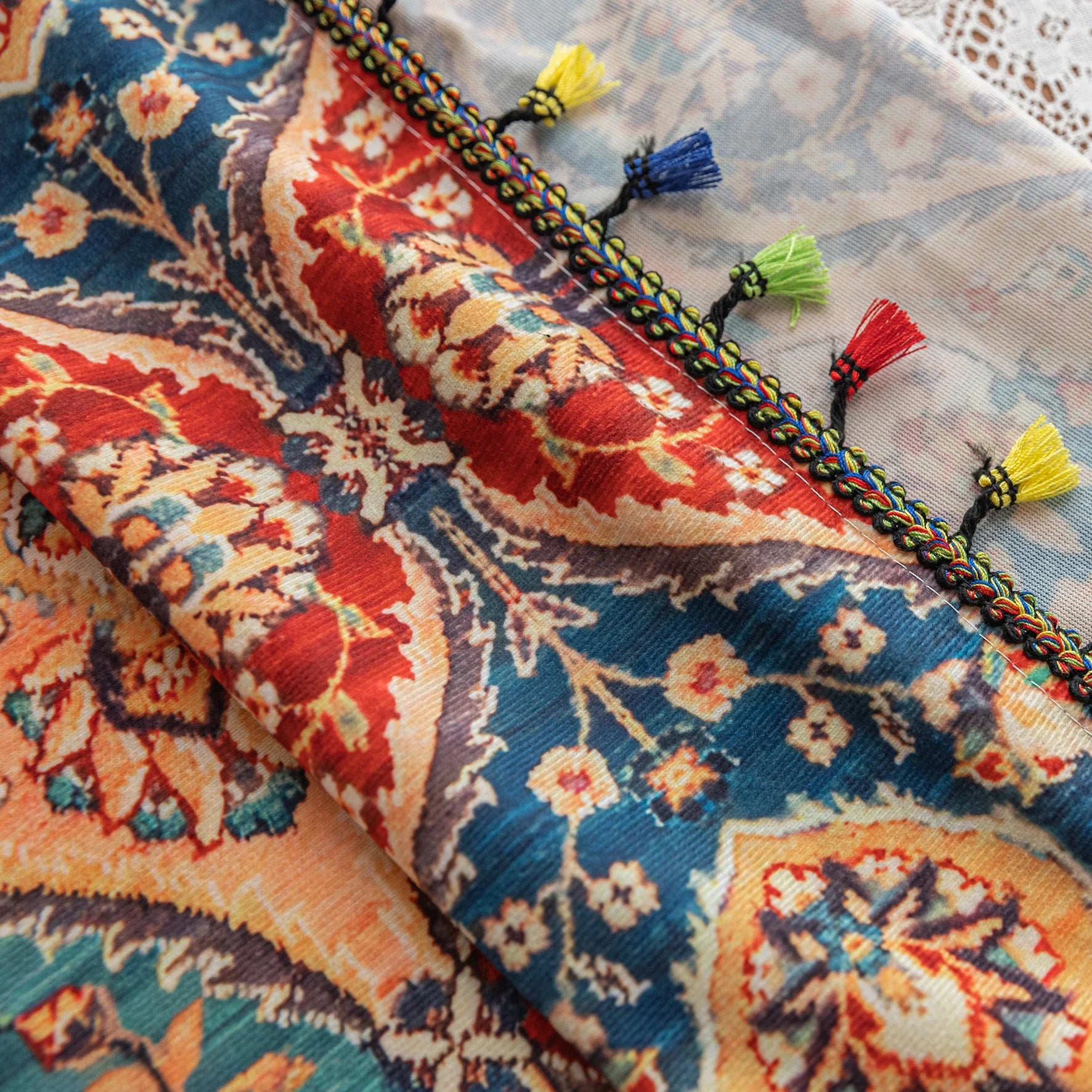 Elegant bohemian curtain featuring a Moroccan-inspired teardrop pattern in warm beige, deep red, and rich blue tones, adorned with intricate floral details and colorful tassel trim — perfect for adding warmth, texture, and global charm to any living space.