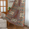 Colorful bohemian curtain with intricate tribal geometric patterns in rich earthy tones of red, beige, turquoise, and gold, accented with multicolor tassels — a perfect choice to add warmth, texture, and global-inspired charm to any room décor.