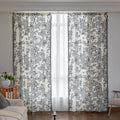 Elegant black and white curtain featuring intricate floral and damask-inspired patterns on a cream background, beautifully finished with matching black tassel trim — perfect for adding timeless sophistication and classic charm to any room décor.