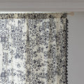 Elegant black and white curtain featuring intricate floral and damask-inspired patterns on a cream background, beautifully finished with matching black tassel trim — perfect for adding timeless sophistication and classic charm to any room décor.