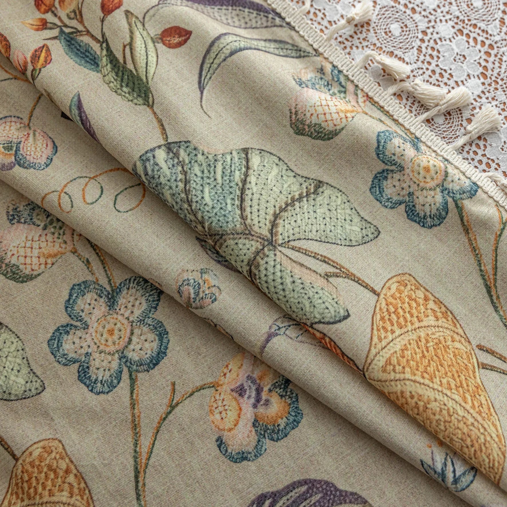 Elegant botanical curtain with a soft beige base, featuring hand-painted style floral and leaf patterns in warm earthy tones and muted pastels, finished with white tassel trim — perfect for bringing a fresh, nature-inspired charm to your home décor.