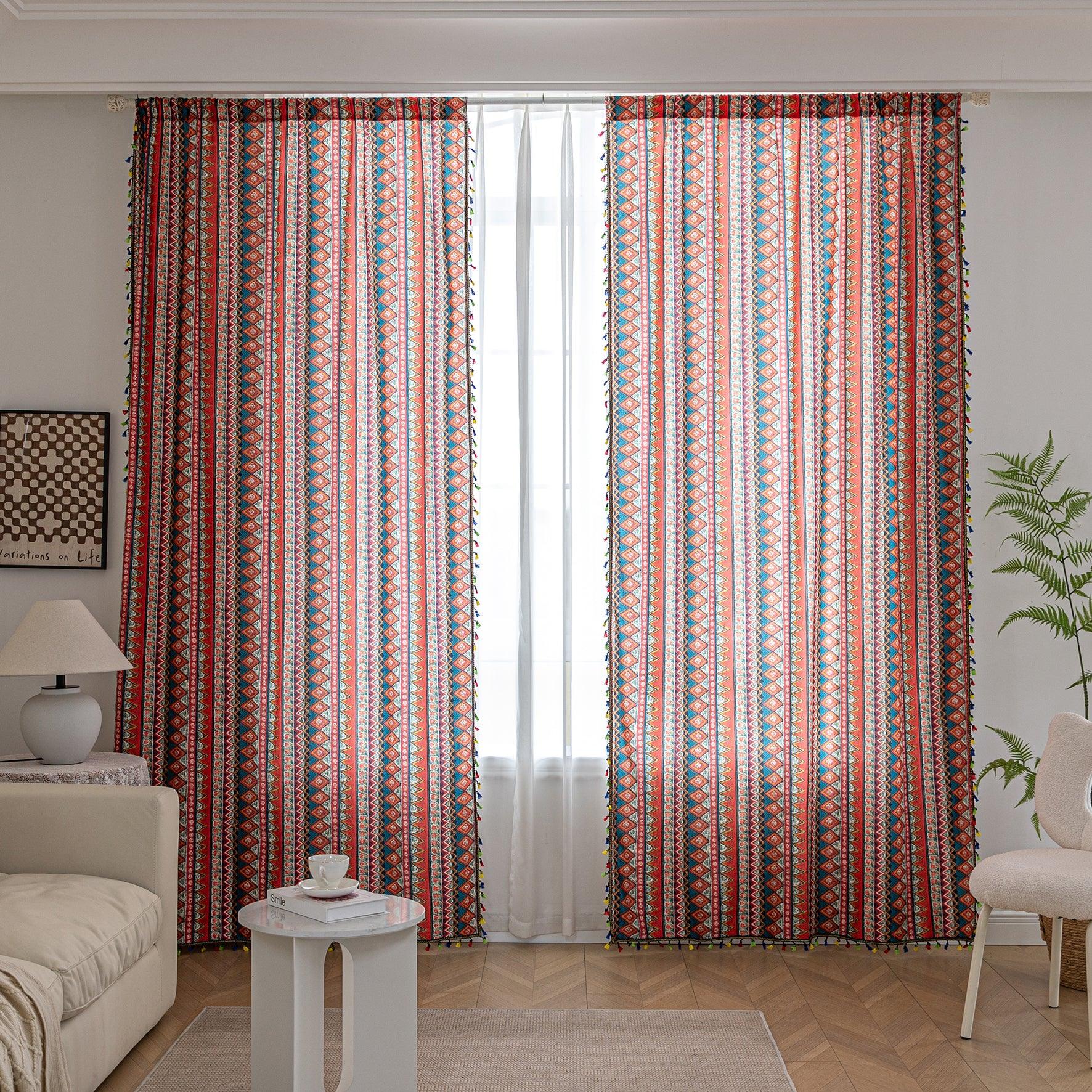 Bold tribal-inspired curtain with vibrant red, blue, and yellow geometric diamond patterns, accented by colorful tassel trim — perfect for adding a touch of ethnic charm and warmth to any bohemian or eclectic home décor.