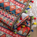 Bold tribal-inspired curtain with vibrant red, blue, and yellow geometric diamond patterns, accented by colorful tassel trim — perfect for adding a touch of ethnic charm and warmth to any bohemian or eclectic home décor.